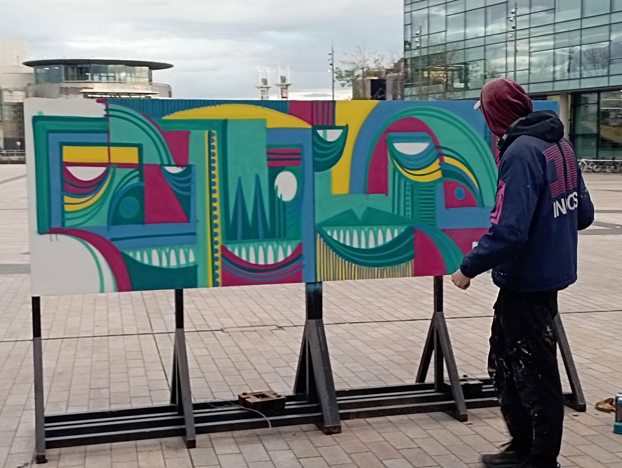 A man creating graffiti art